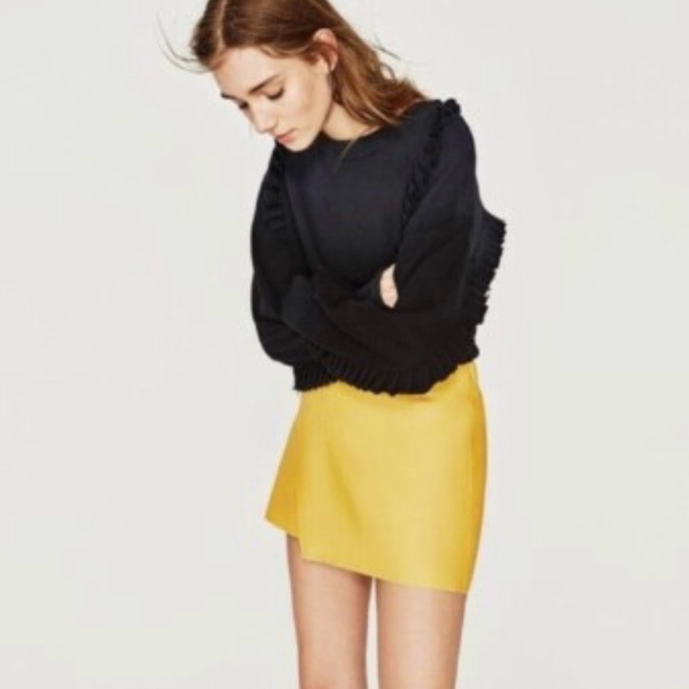 The Zara Trafaluc faux leather mini skirt in size Small
